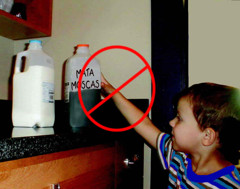 photo - child reaching for pesticide container