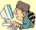 Image of a man sitting at a computer