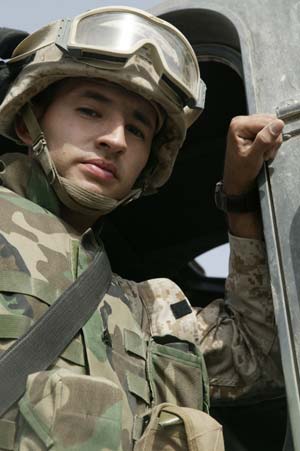 Cpl. Danny R. Suarez, a truck driver currently attached to Combat Service Support Company 115,  put firefighter and paramedic careers on hold when his unit was activated twice -- once during the initial phase of Operation Iraqi Freedom in 2003, and in late-August 2004. Suarez is deployed out of 6th Communications Battalion, a reserve unit out of Brooklyn, N.Y. He is a 24-year-old native of New York. Photo by: Sgt. Luis R. Agostini