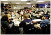 Photo of emergency workers sitting in a classroom.