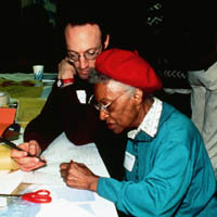Photo: a man and a woman working on the streetscape plan