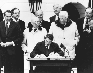 President Reagan signing the 1983 Amendments