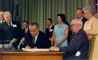 President Johnson signs Medicare bill