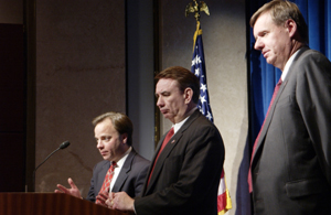 Secretary Tommy G. Thompson, FDA Commissioner Dr. Mark McClellan, and Federal Trade Commission Chairman Timothy J. Muris answer questions during a press conference announcing FDA actions to reduce potential risks of dietary supplements containing Ephedra. HHS Photo Chris Smith.