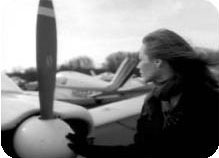 A still from Christy's television PSA - Christy at the airfield missing her Dad.
