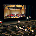 Researchers seated in the University of California's (USC) Bing Theater, view a test screening of a prerecorded symphony performance by the New World Symphony of Miami Beach that was streamed coast-to-coast over the Internet for an audience of 500 top Internet researchers. The screening took place using breakthrough digital video and audio technology produced at the Integrated Media Systems Center (IMSC), a National Science Foundation Engineering Research Center located at USC.<BR>
<BR>
The performance was transmitted in high-definition digital video and IMSC's multichannel Immersive Audio to a 30-foot screen in the theater. IMSC researchers recorded the original concert with new technology in order to recreate the sense of 