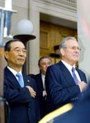 Defense Secretary Donald Rumsfeld, right and South Korean Defense Minister Yoon Kwang Ung stand during the National Anthem at the Pentagon on Oct. 22.