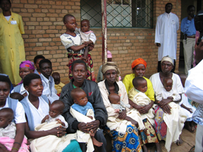 Local women waiting with children for treatment.
