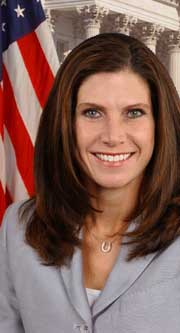 portrait of representative mary bono with us flag and capitol in background