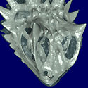Head scan of a Texas Horned Lizard, part of a series of 3-D head scans showing clear skin and solid bone.<BR>
<BR>
The images were created at the High-Resolution X-ray Computed Tomography Facility (UTCT) at the University of Texas, Austin. The UTCT--a National Science Foundation-supported shared multi-user facilitygives researchers a nondestructive technique for visualizing features in the interior of opaque solid objects as well as obtain digital information on their 3-D geometries and properties. The scans were taken as part of on-going research by Wendy Hodges, a University of California-Riverside biologist who is attempting to reconstruct the physical features of the common ancestor of the 13 species of North American horned lizards.<BR>
<BR>
Between 23 and 30 million years ago, the first North American horned lizards branched off from sand lizards, becoming stockier and spinier and evolving their distinctive crowns of horns. A single common ancestor gave rise to the 13 North American species, each developing a unique set of cranial horns and spikes. Researchers are trying to determine what this prehistoric, common ancestor may have looked like and how the horns of these species developed.  <I>[This image is 2 in a series of 3; see also, <B>Head Scan  Clear Skin and Bone, Image 2 and 3</B>. This image is also one of several related images pertaining to Dr. Hodges research on horned lizards. See related images: <B>Color Head Scan - External Skin and Internal Skeleton, Image 1 through 5</B>, <B>Basking Coast Horned Lizard</B> and <B>Coast Horned Lizard</B>.]</I><BR>
<BR>
<U><B>More about this Image</B></U><BR>
With the assistance of Reuben Reyes, a visualization expert from the Texas Advanced Computing Center (UT-Austin), Wendy Hodges is applying advanced computer analysis and graphics techniques to three-dimensional data sets acquired through computed tomography (CT). CT reconstruction allows the analyses and comparison of the morphologies of different species of horned lizards. The final goal of the project is the visualization of the evolution of horns in this group of lizards and determining how horn number increased through evolutionary time.<BR>
<BR>
Hodges and Reyes have been applying 