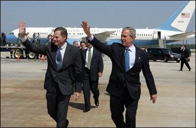 President George W. Bush arrives in Raleigh, North Carolina with Congressman Richard Burr on Wednesday July 7, 2004. The President was in North Carolina to meet with pending North Carolina judicial nominees. White House photo by Paul Morse.