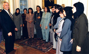 Secretary Powell with Afghan women officials at Department reception held in their honor.