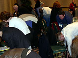 Picture 1, Somali Bantu Session: Attendees during a group stretching exercise