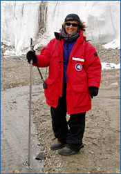 Scientist measuring stream levels