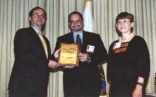 Photo of Dr. Gary Carmichael, left David Leiter and Lynn Starnes