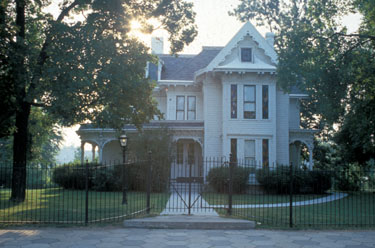 The Truman Home before exterior woodwork rehabilitation