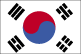 Flag of South Korea is white with a red (top) and blue yin-yang symbol in the center; there is a different black trigram from the ancient I Ching (Book of Changes) in each corner of the white field. 2004.