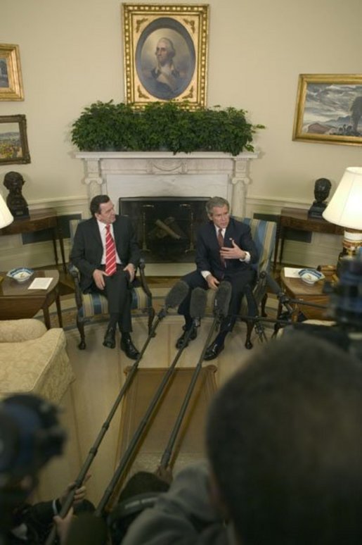 President George W. Bush and German Chancellor Gerhard Schroeder hold a joint press conference in the Oval Office Friday, Feb. 27, 2004. White House photo by Eric Draper.