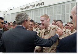 President George W. Bush talks with Robert Jackson of the 186th Military Police Company at the Iowa Air National Guard Base in Des Moines, Iowa, Thursday, April 15, 2004. Jackson was injured while serving in Iraq. White House photo by Paul Morse.
