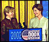 Laura Bush welcomes Ludmila Putina, wife of Vladimir Putin
, President of the Russian Federation, to the Second Annual National Book Festival Saturday, October 12, 2002 in the East Room of the White Hous
e. Standing with the First Ladies on stage are, left to right, Native American poet Lucy Tapahoso, writer Mary Higgins Clark, Librarian of Congr
ess James Billington, and NBA player Jerry Stackhouse.