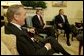 During a meeting with Secretary of Defense Donald Rumsfeld, President George W. Bush announces L. Paul Bremer, center, as the presidential envoy to Iraq in the Oval Office Tuesday, May 6, 2003. "He's a man of enormous experience; a person who knows how to get things done; he's a can-do type person," said the President of the former ambassador. White House photo by Paul Morse.