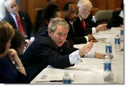 President George W. Bush holds a roundtable conversation about the positive effects that faith-based initiatives have had on local people at Union Bethel African Methodist Episcopal Church in New Orleans, La., Thursday, Jan. 15, 2004. "We just had a lot of people from the community, people who have been helped, people who are helping, neighborhood healers here to share their stories," said the President about the discussion in his remarks. White House photo by Eric Draper.