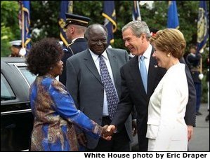 President George W. Bush and Mrs. Laura Bush welcome President Mwai Kibaki and Mrs. Kibaki of the Republic of Kenya to the White House Monday, October 5, 2003. White House photo by Eric Draper.