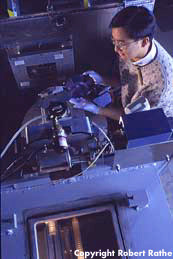 Eric Lin places a semiconductor wafer in the path of a focused neutron beam.