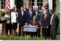 President George W. Bush signs S.15-Project Bioshield Act of 2004, in the Rose Garden Wednesday, July 21, 2004. White House photo by Paul Morse.