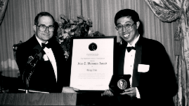 Dr. Gang Tian  1994 Alan T. Waterman Award Recipient and Dr. Neal Lane, NSF Director