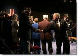 President George W. Bush greets veterans after speaking to the Veterans of Foreign Wars convention in Cincinnati, Ohio, Monday, Aug. 16, 2004. White House photo by Paul Morse.