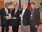Active Cities awards officials and a winning city award recipient