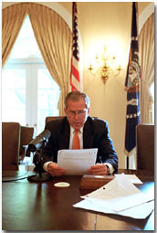 President George W. Bush records the weekly radio address for Cinco de Mayo in the Cabinet Room. This is the first time that a president has recorded the radio address in Spanish and in English. WHITE HOUSE PHOTO BY ERIC DRAPER