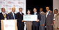 Secretary Chao presents a check to Marc H. Morial, President and Chief Executive Officer of the National Urban League, and members of the Board of Directors and local Chapter Presidents.