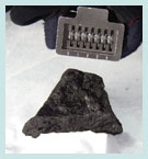 Photo of the meteorite as it was collected in Antarctica.