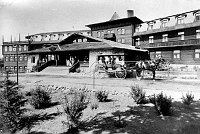 2 HORSE CARRAIGE TO RIGHT OF FRONT ENTRANCE, EL TOVAR HOTEL. FAMILY ON PORCH. CIRCA 1908