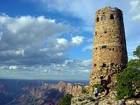 BUILT IN 1932 BY MARY COLTER, THE DESERT VIEW WATCHTOWER OVERLOOKS THE EASTERN END OF GRAND CANYON NATIONAL PARK. THE COLORADO RIVER IS VISIBLE LOWER LEFT.