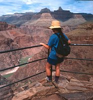 A HIKER VIEWING THE COLORADO RIVER FROM PLATEAU POINT,  A 12.5 MILE ROUND TRIP FROM THE BRIGHT ANGEL TRAILHEAD IN GRAND CANYON VILLAGE.