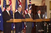 (From left to right) Australian Foreign Minister Alexander Downer, Secretary Powell, Secretary of Defense Donald H. Rumsfeld, and Australian Defense Minister Robert Hill.
