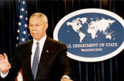 Secretary Powell at podium in Department of State briefing room