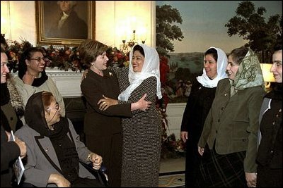 Laura Bush greets women teachers from Afghanistan in the Diplomatic Reception Room of the White House, Dec. 4, 2002. White House photo by Susan Sterner.