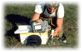 Image of man using equipment to take a water sample measurement 
