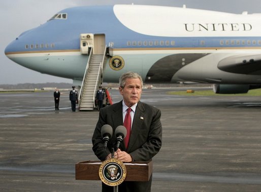 President George W. Bush delivers a statement to the media in front of Air Force One at Toledo, Ohio Express Airport, Friday, Oct. 29, 2004. White House photo by Eric Draper.