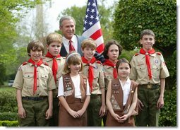 President George W. Bush congratulates the Dodge Elementary Scouts for Wetland Habitat Enhancement of East Amherst, N.Y., on receiving the President’s Environmental Youth Award in the East Garden April 22, 2004. White House photo by Susan Sterner.