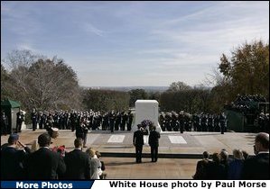 President George W. Bush visit the Tomb of the Unknowns at Arlington National Cemetery on Veterans Day Thursday, Nov. 11, 2004. After paying his respects, the President delivered remarks at the cemetery's amphitheater. White House photo by Paul Morse.