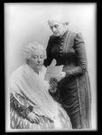 Elizabeth Cady Stanton, seated, and Susan B. Anthony, standing