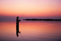 Women fishing in the evening, Credit USFWS