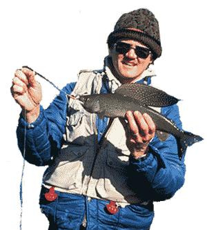 Angler holding a fish, Credit USFWS