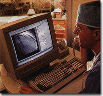 Clinician looking at image on computer screen
