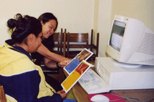 Figure 4: Leslie Hsu interviewing a student at Din College Library.